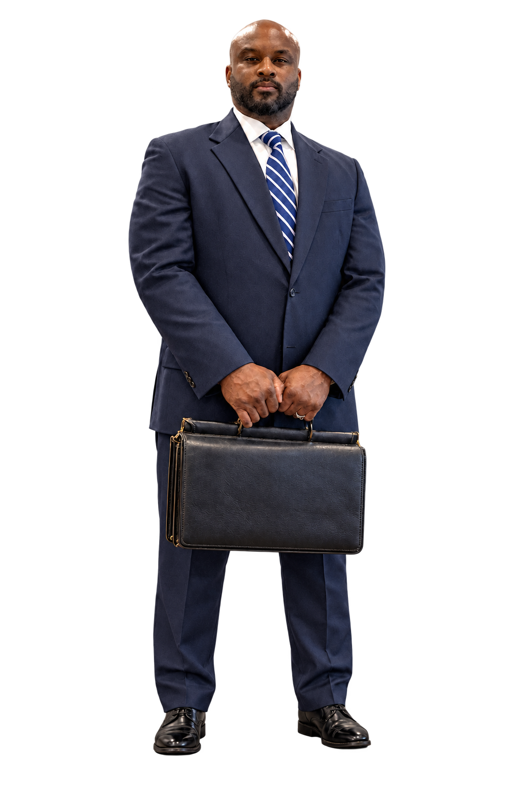 Charles H. Boyce Jr., Esq., standing in a navy suit with a briefcase