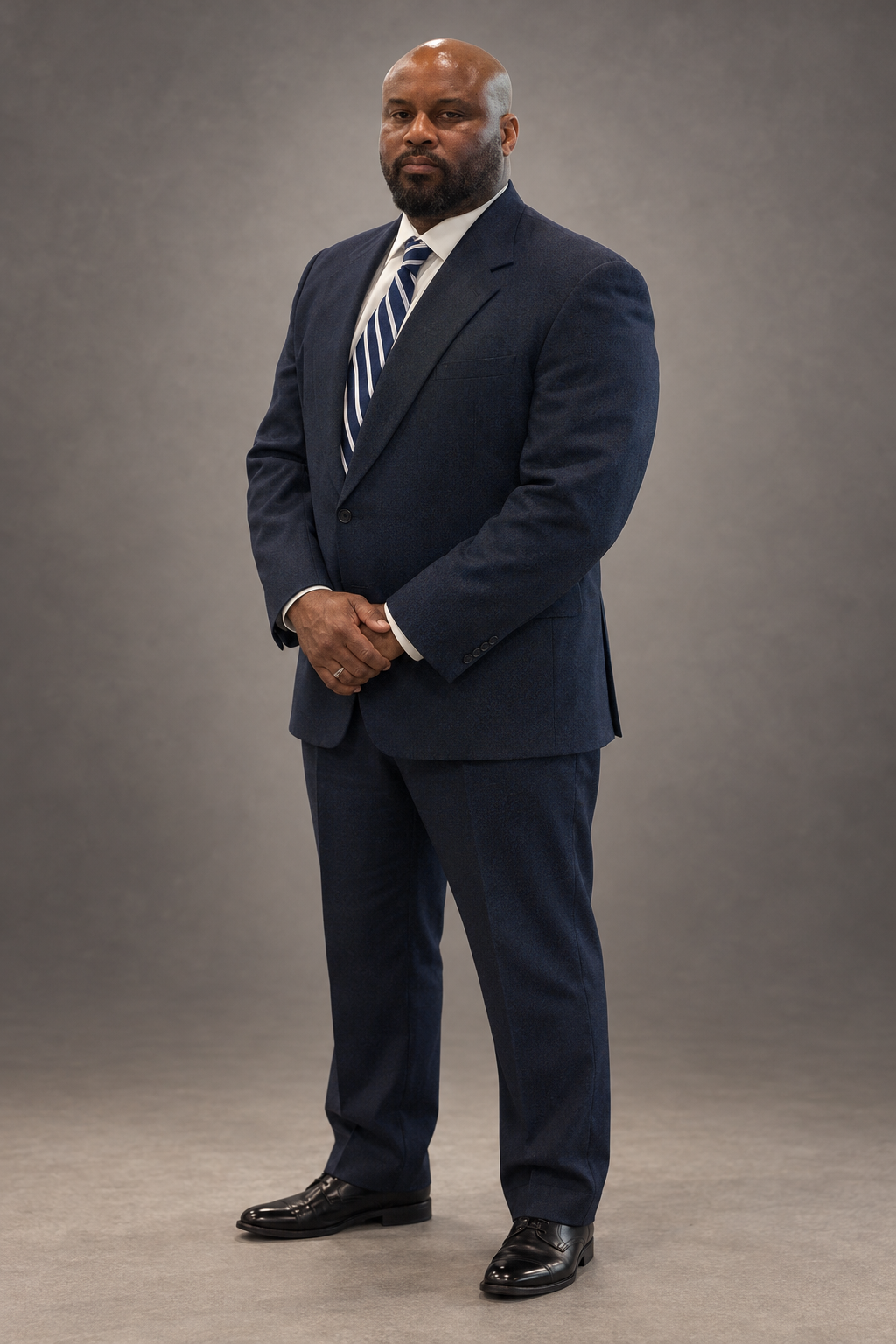 Charles H. Boyce Jr., Esq., in a navy suit