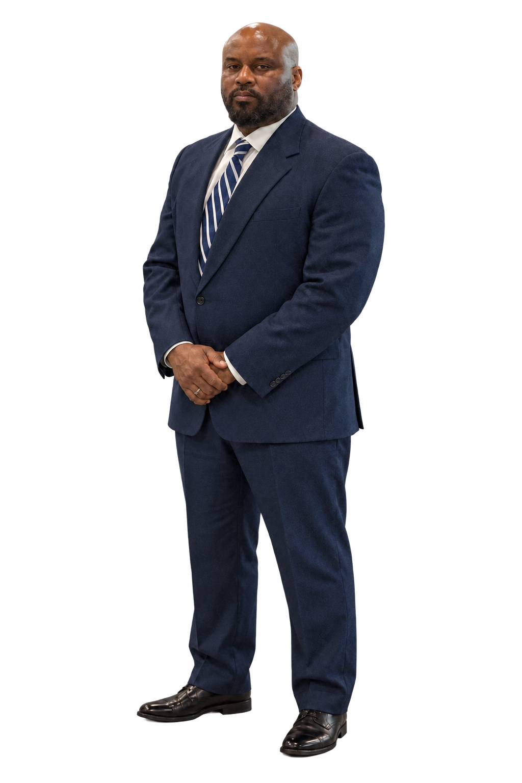 Charles H. Boyce Jr., Esq., standing in a navy suit